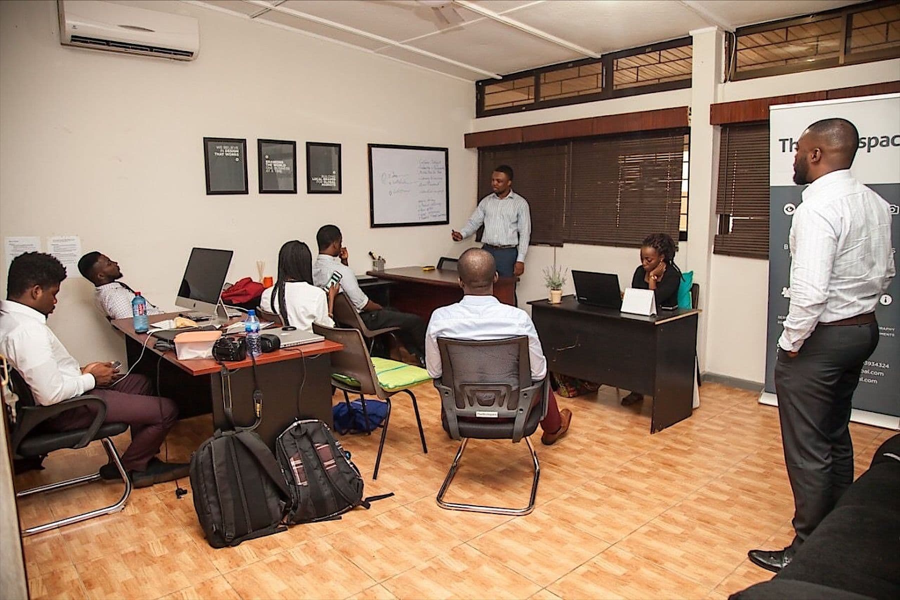 An early Workspace training session in Accra, with the team at laptops around the room
